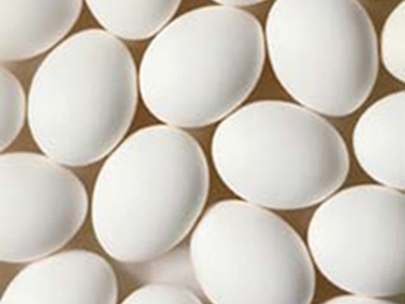  Close up of several white chicken eggs, photo.