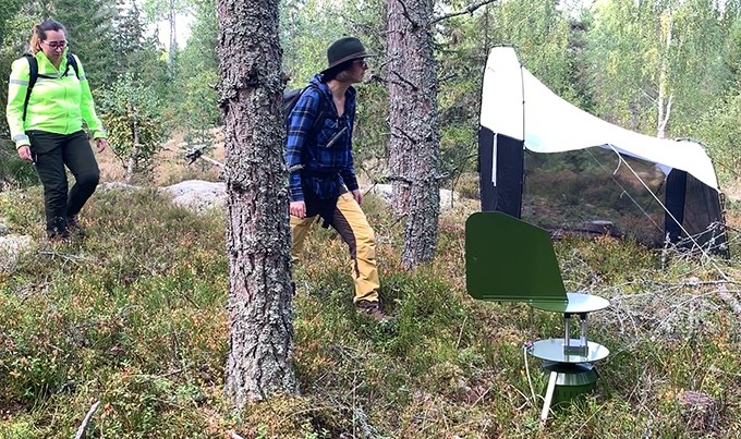Two women in the forest.