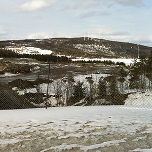 Winter view of wind farm with some wind turbines on a mountain. Photo.