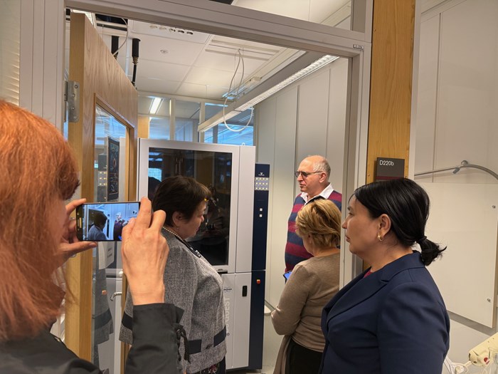 prefect Vadim Kessler showing research facilities