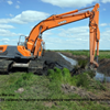 Ditch cleaning in Russia. Photo.