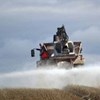 Spreading of gypsum. Photo.