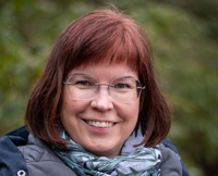 Portrait of a woman outdoors. Photo.