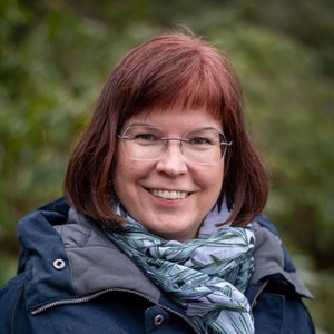 Portrait photo of a woman outside. Photo.