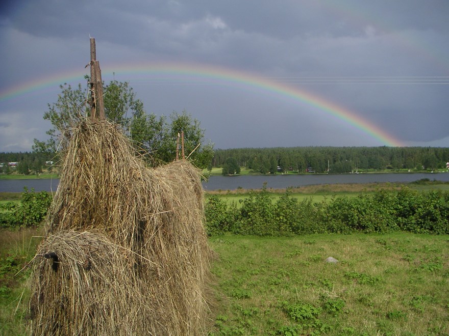 Rainbow and stack of hay