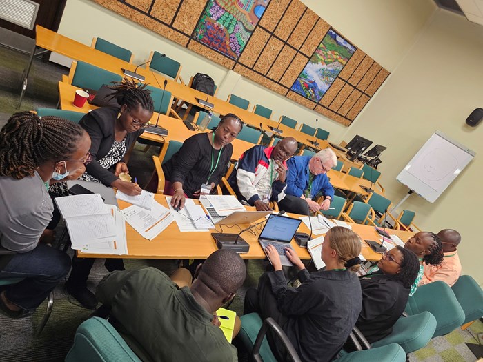 The team engaged actively in discussions through group activities, presentations, and the panel.