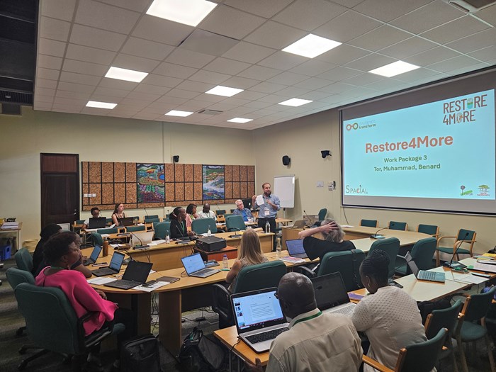 The team engaged actively in discussions through group activities, presentations, and the panel.