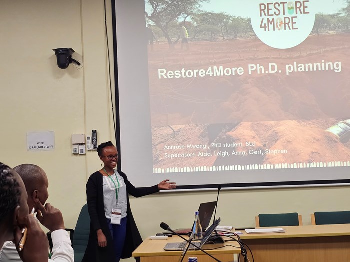 The team engaged actively in discussions through group activities, presentations, and the panel.