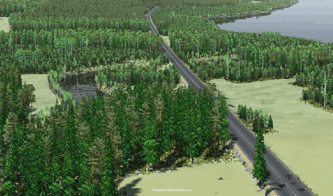 Landskapsbild med skogsbestånd och kalytor, ett stort vattendrag och en sjö. Bild. 