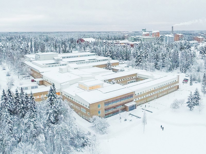 The building SLU Umeå in winter landscape from above. Photo from drone.