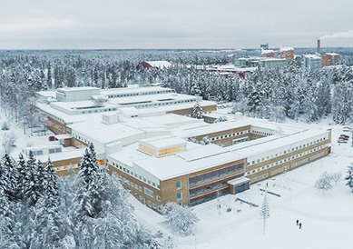 The building SLU Umeå in winter landscape from above. Photo from drone.