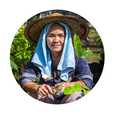  Portrait of Linne Murang pruning tree seedlings.