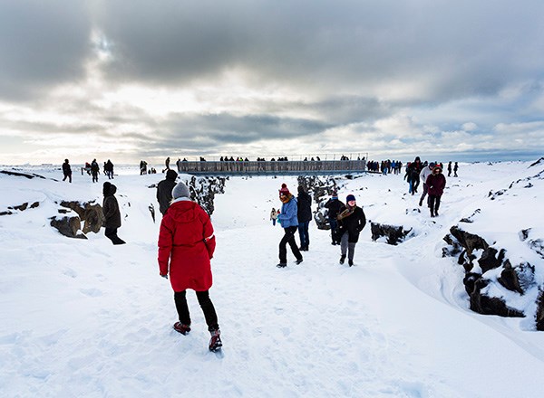  People on an excursion in winter landscape.