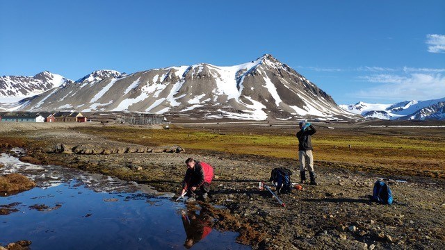 Sampling at lake. Photo.