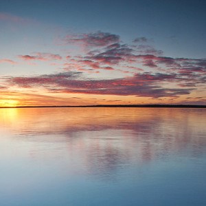 Sunset over a lake. Photo.