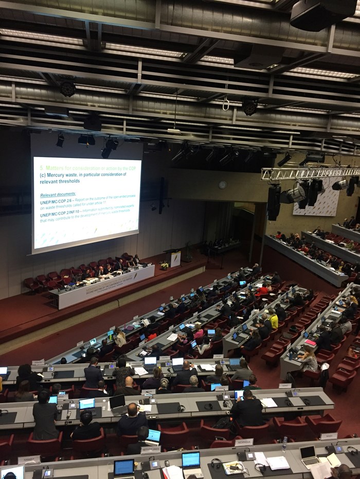 Audience in a large lecture room. Photo.