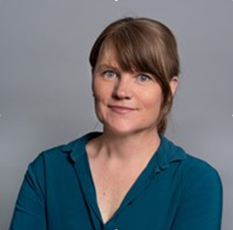 A portrait photo of a woman.