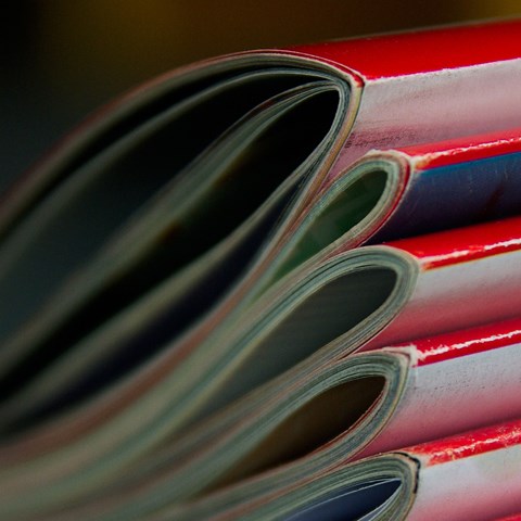 Close up of a pile of journals, photo.
