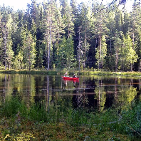 Photo of two persons in a canoe