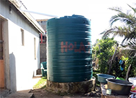 Water tank for collecting rain water from roof