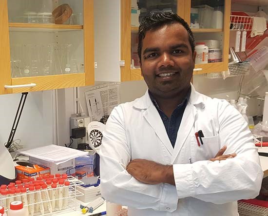 Hasitha Priyashantha has been awarded by The American Dairy Science Association. Picture shows Hasitha in the lab, photo.