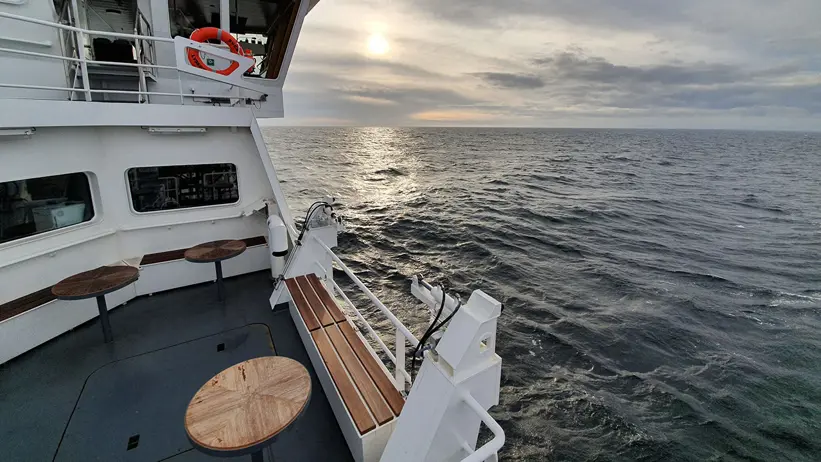 Table and chairs on deck