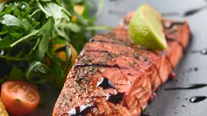 Salmon on a dinner plate.