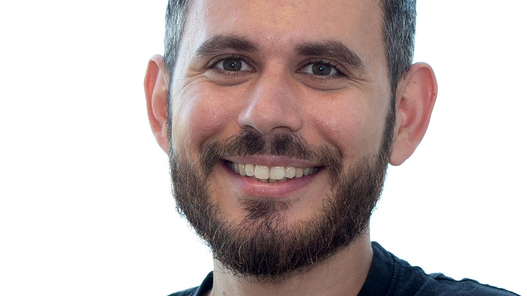 A portrait of a happy man with a beard. Photo.