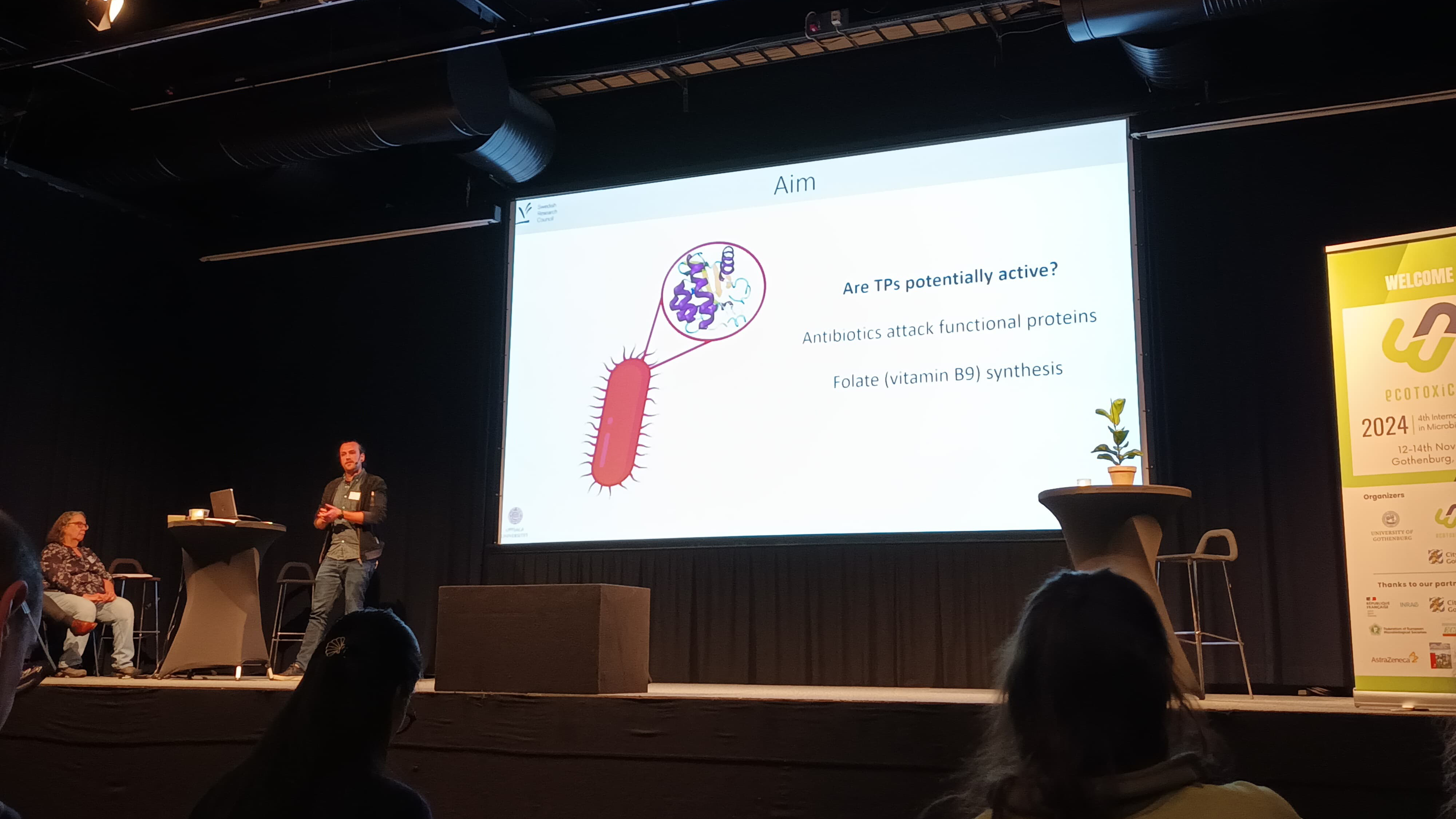 A man on a stage. Photo.