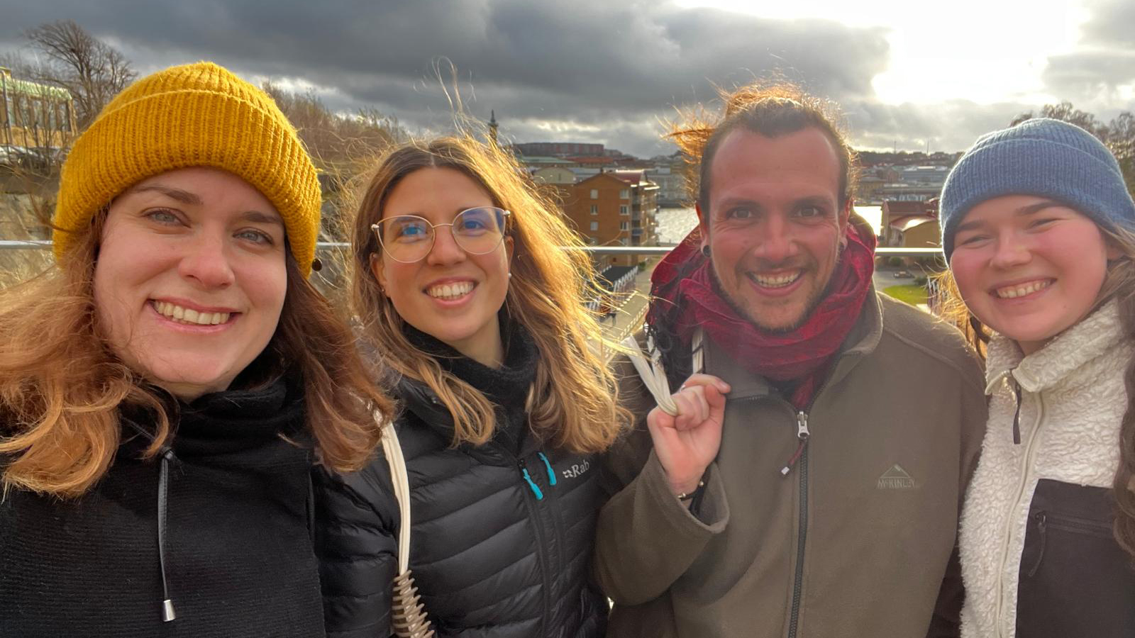 Happy people in a city. Photo.