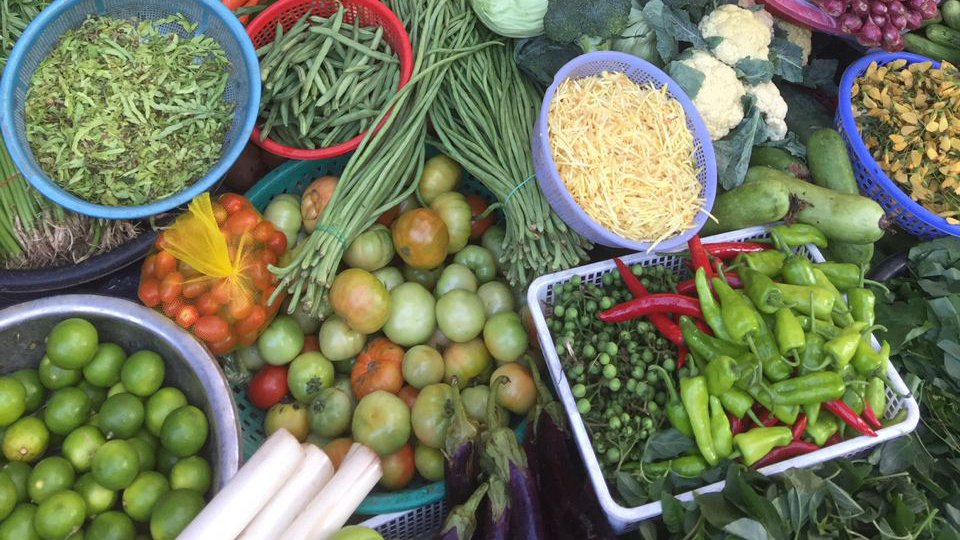 Vegetables at a market in Cambodia. Photo.