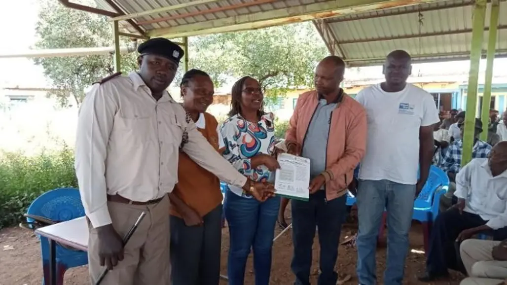 b) Sharing fact sheets to Member County Assembly (MCA), community administrator and farmers in one of the wards in Embu