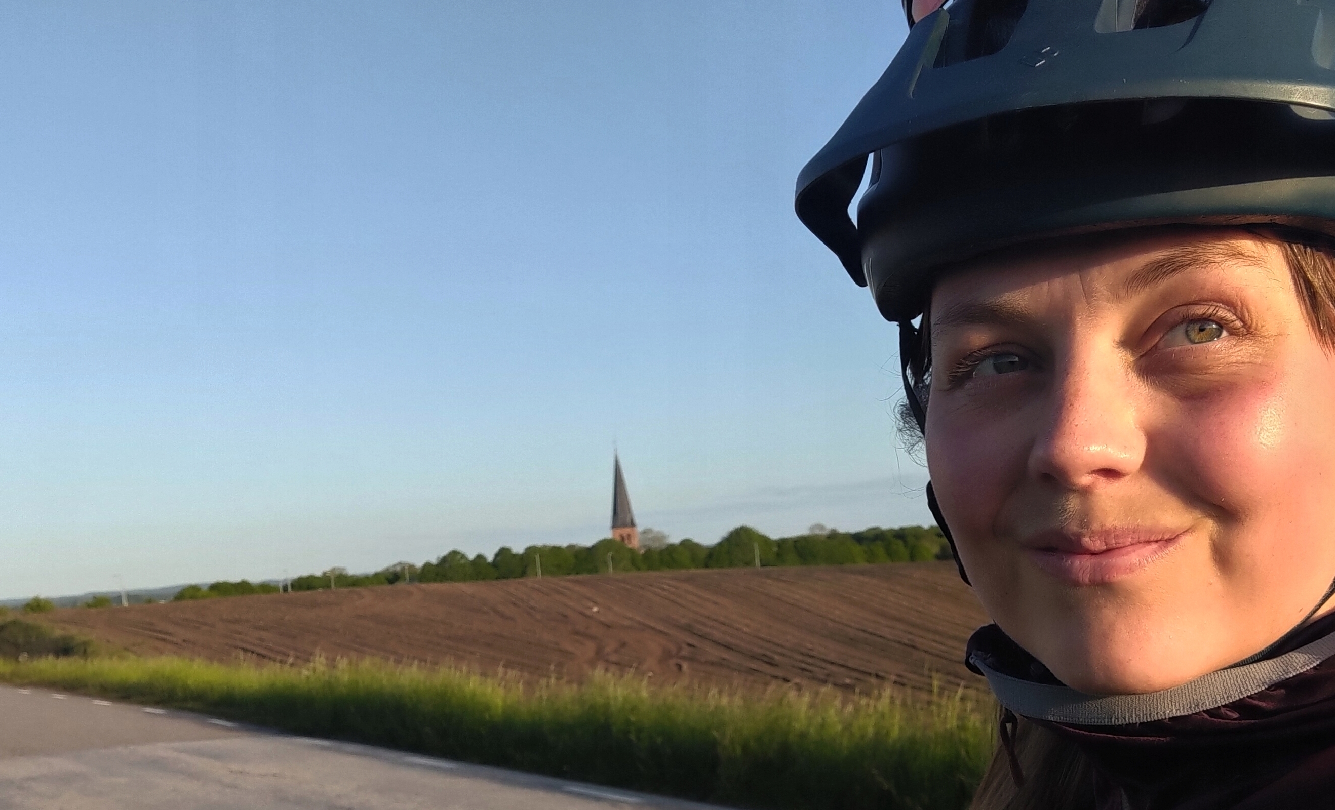 Person in outdoor clothing taking a selfie.